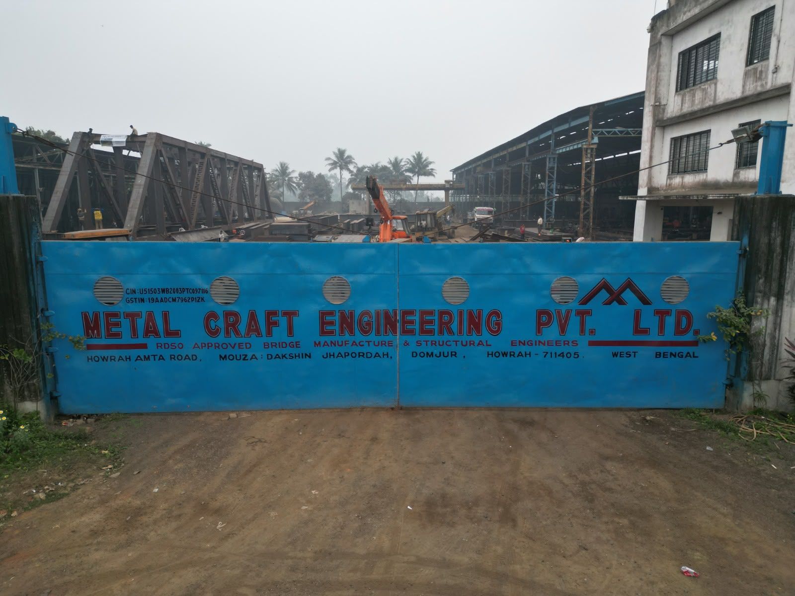 Blue Metal Craft Engineering gate at the factory entrance